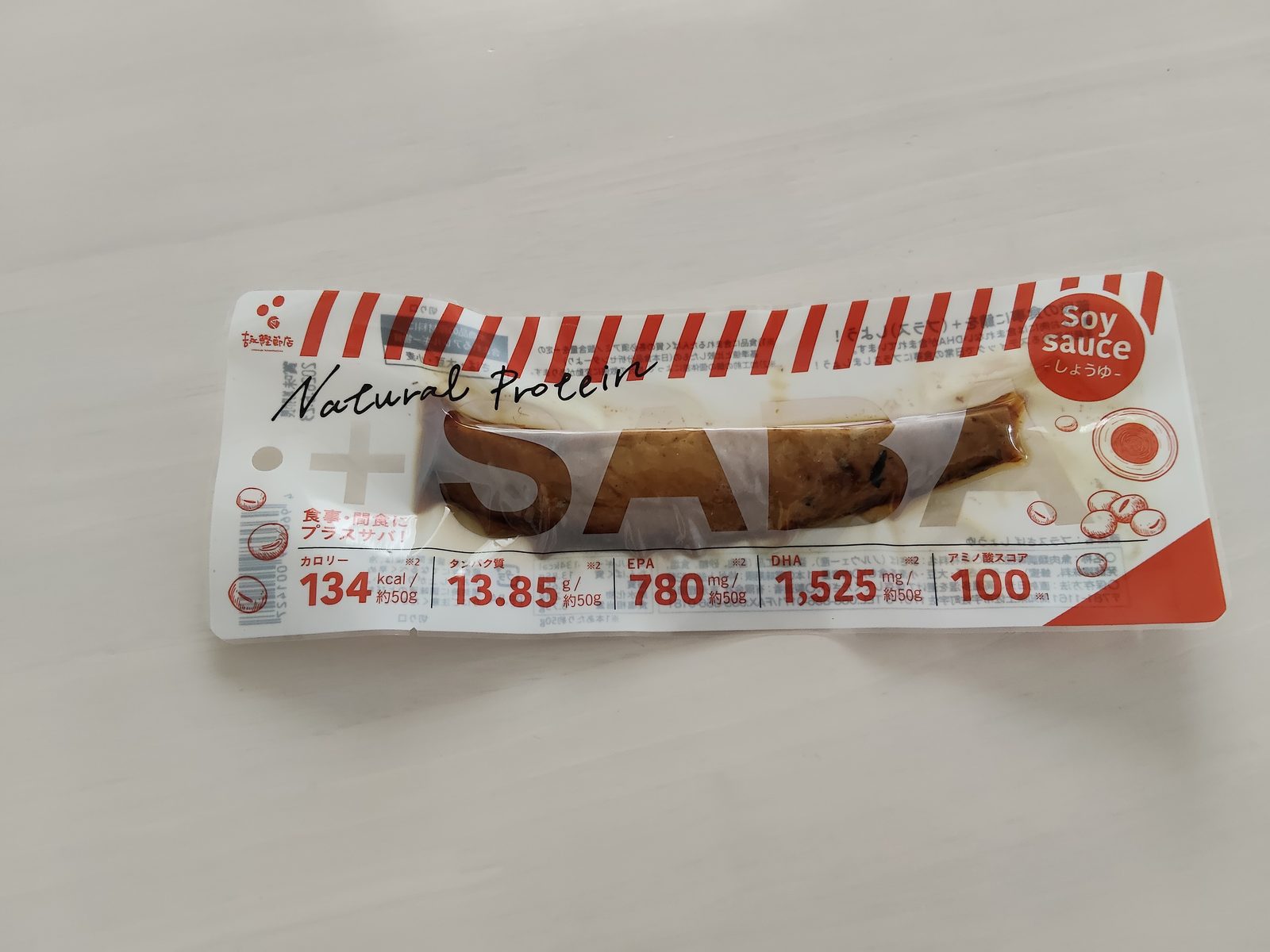 プラスサバ(+SABA)しょうゆ味のパッケージ表面